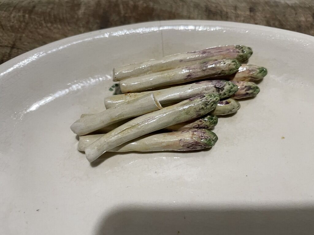 3 plates decorated with vegetables