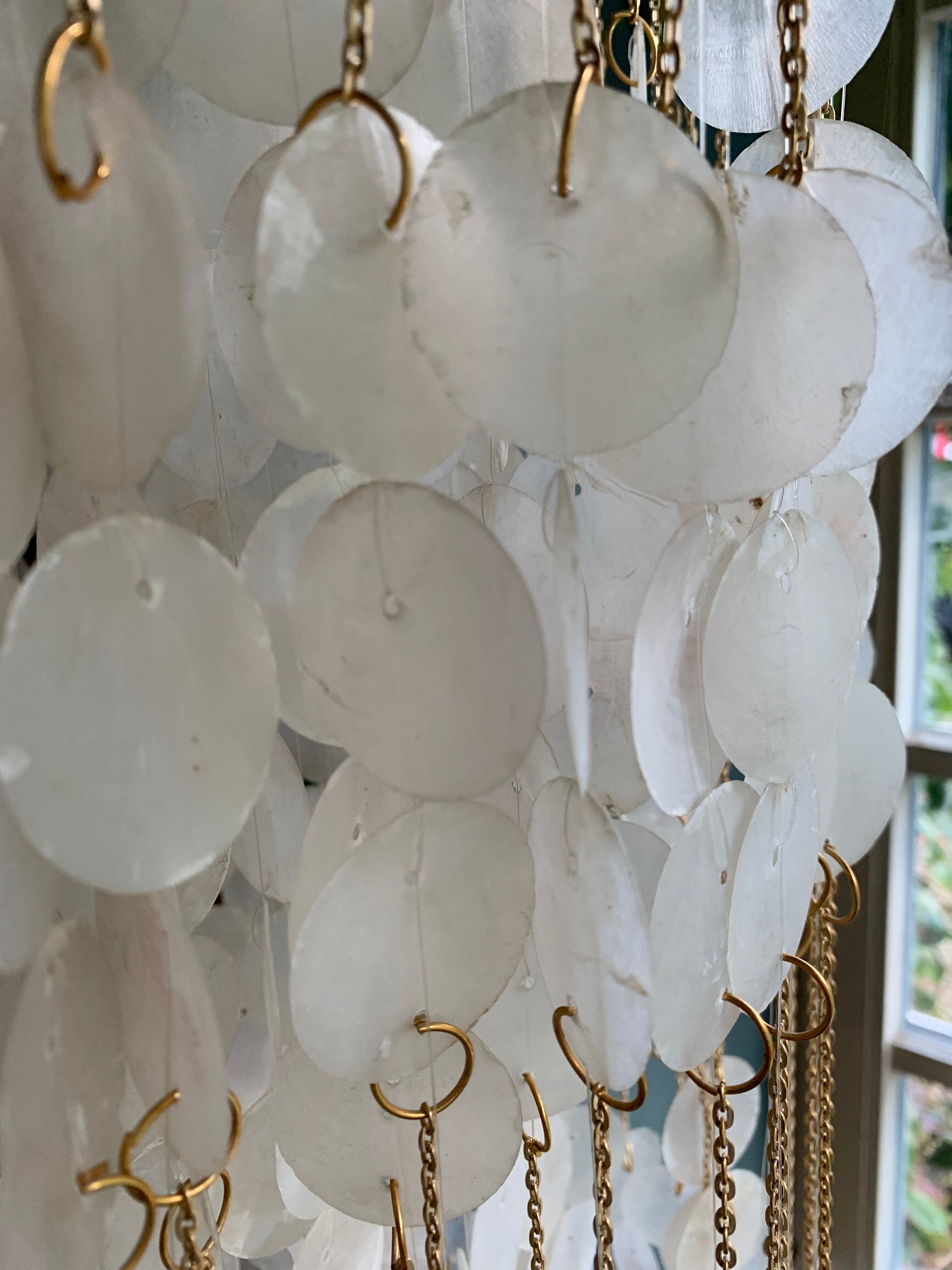 Suspension en pastille de nacre