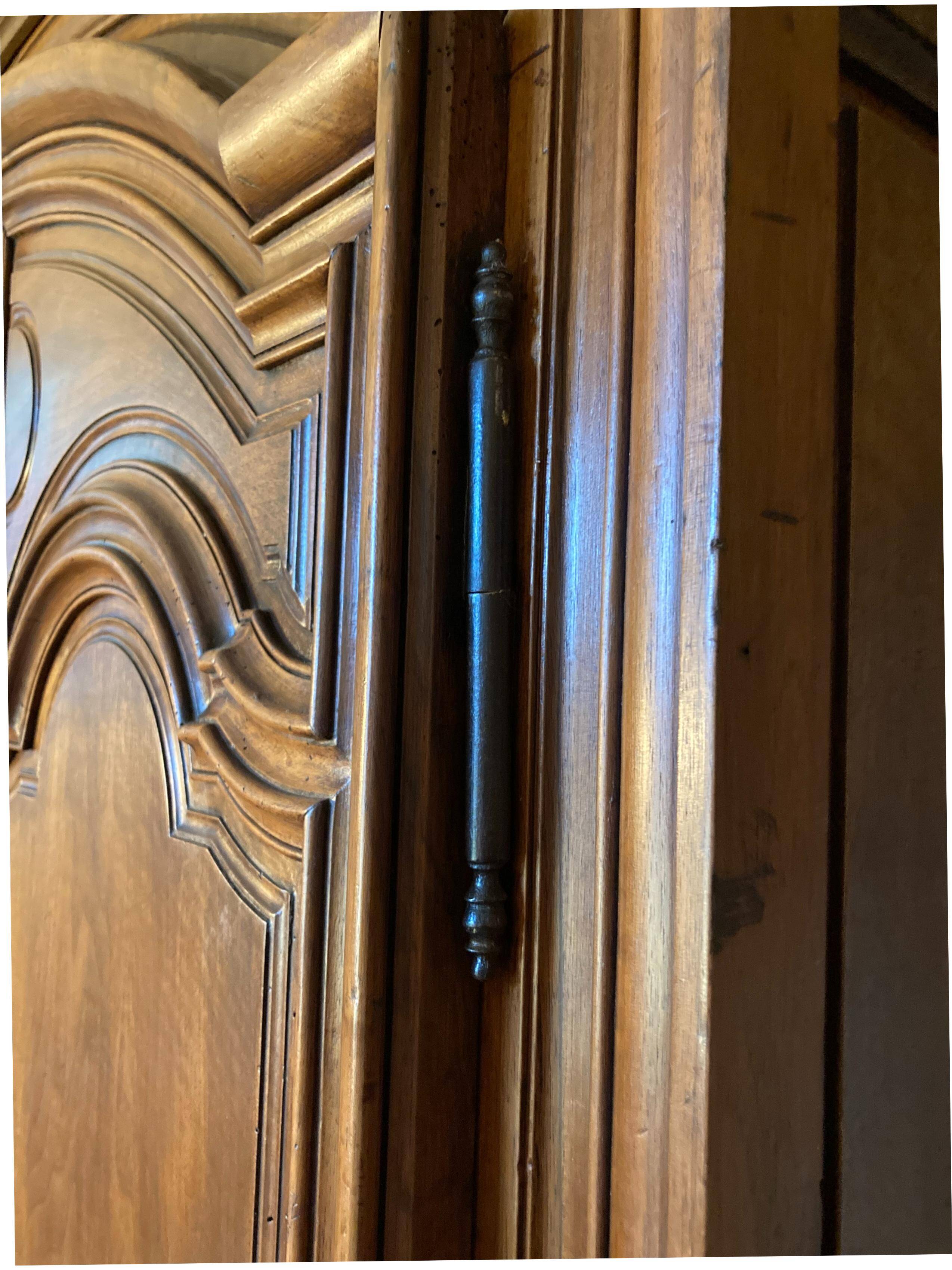 Versailles wardrobe in walnut, 18th century