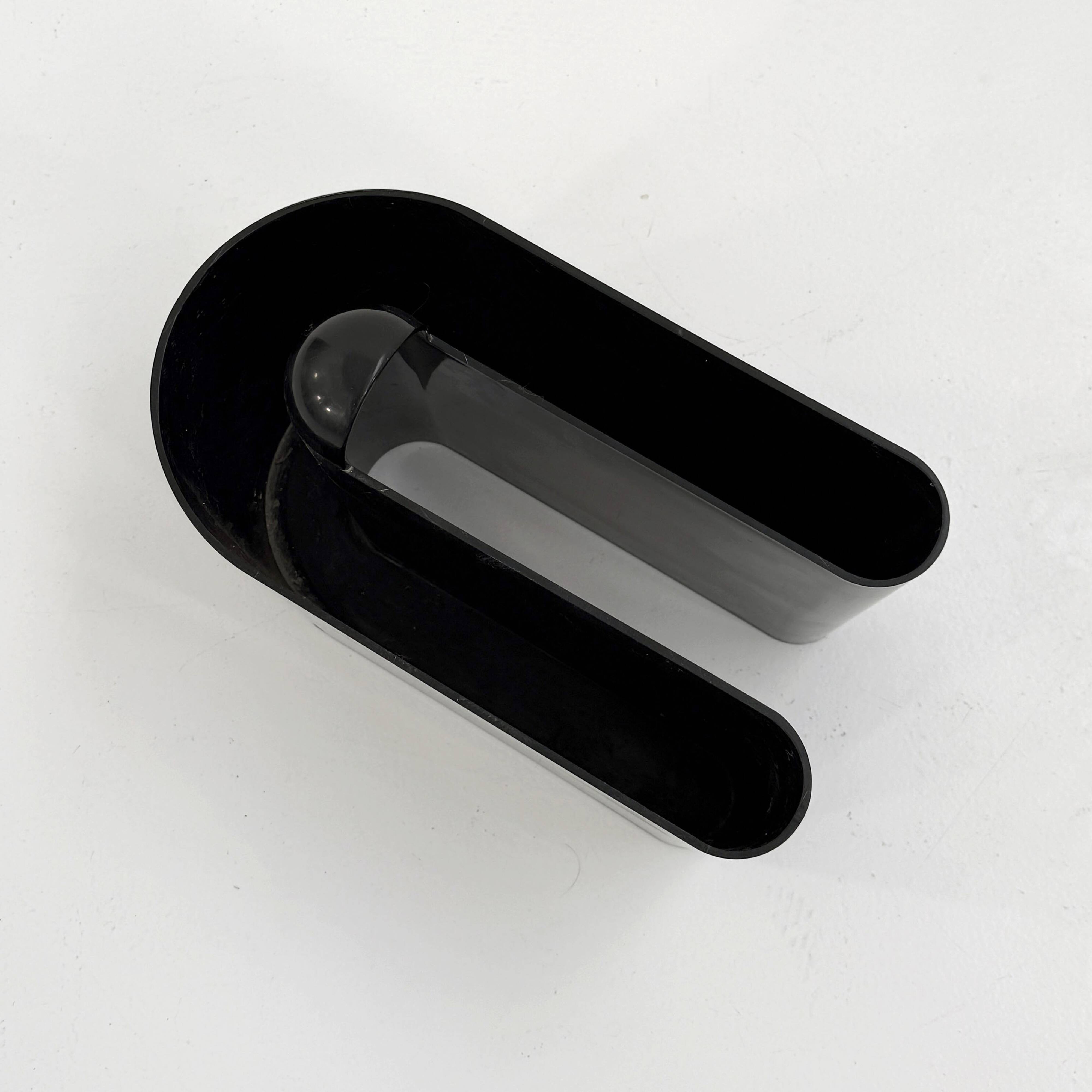 Black magazine rack by Rodolfo Bonetto for Bilumen, 1970