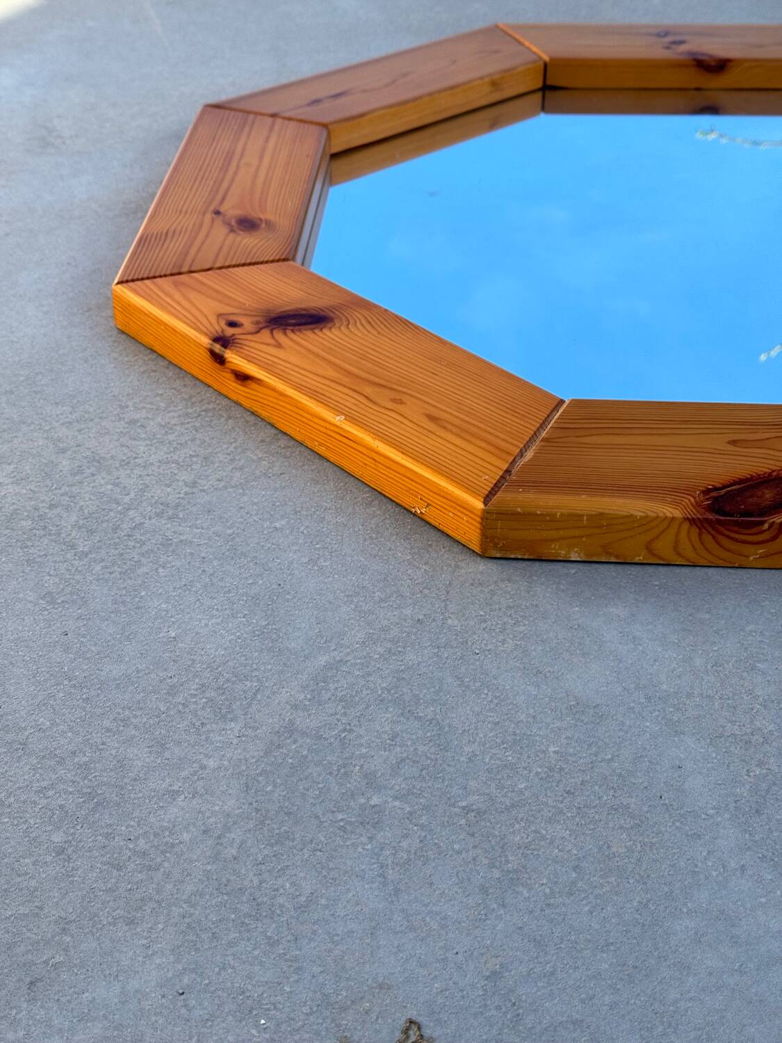 Octagonal pine mirror in 1980s Scandinavian design.