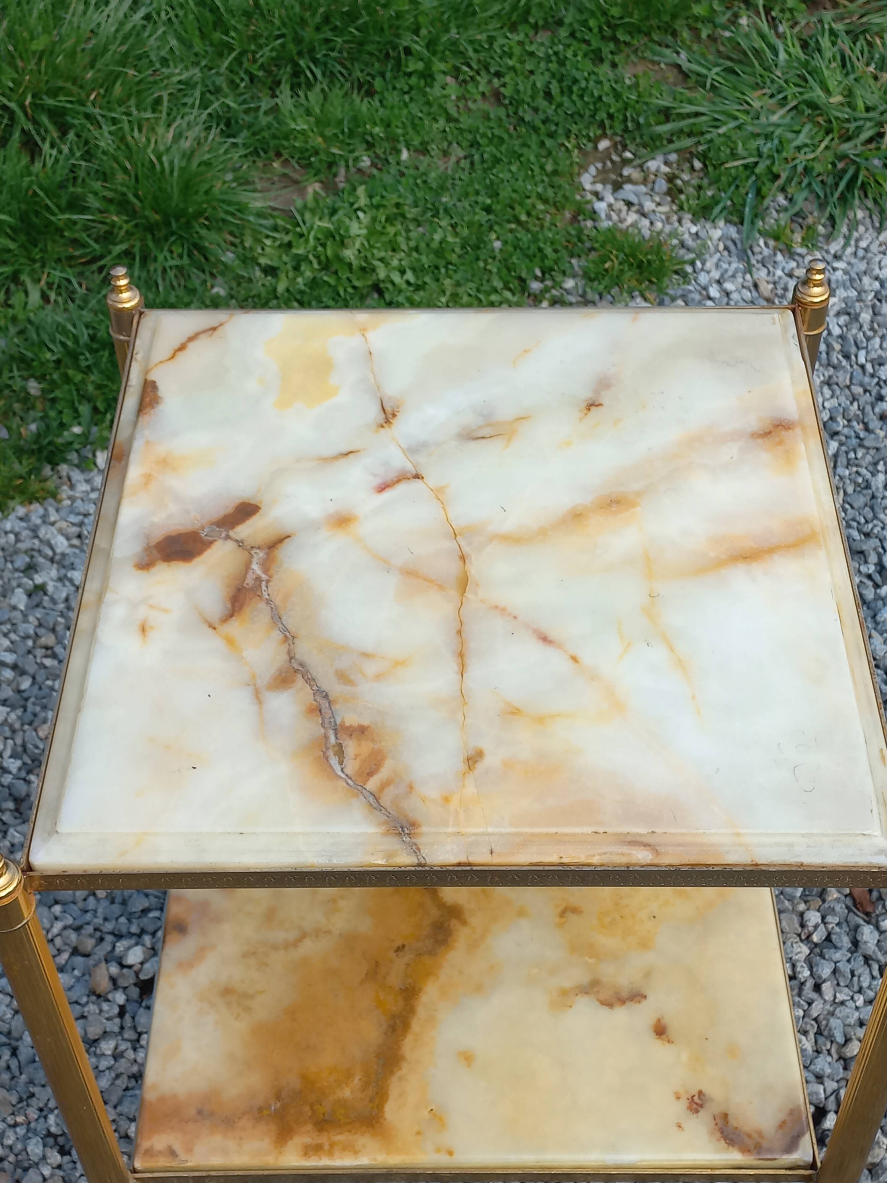 Pair of neoclassical side tables in bronze, brass, marble, and o.