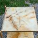 Pair of neoclassical side tables in bronze, brass, marble, and o.