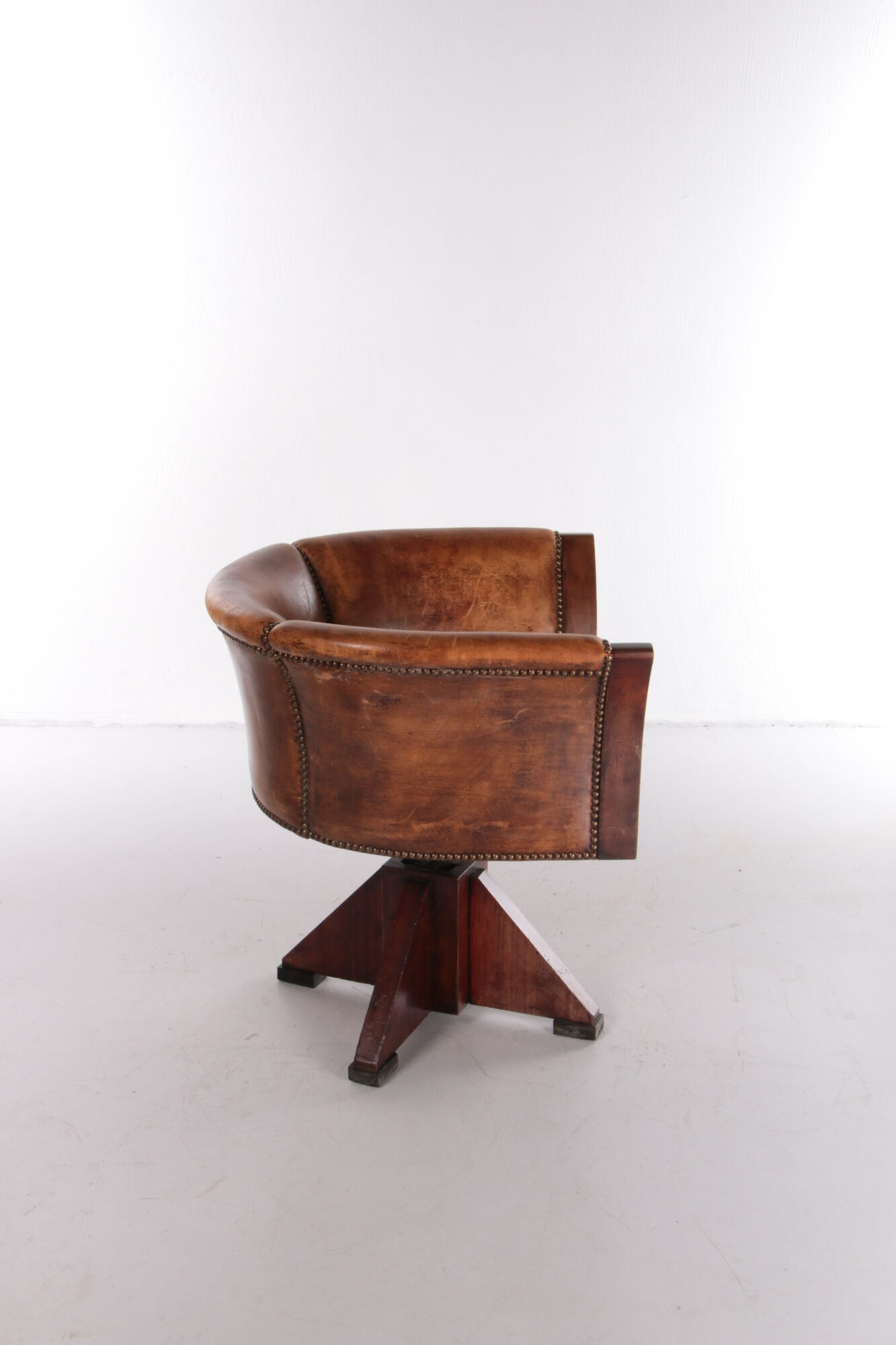 Sheepskin leather desk chair with wooden swivel base, 1970