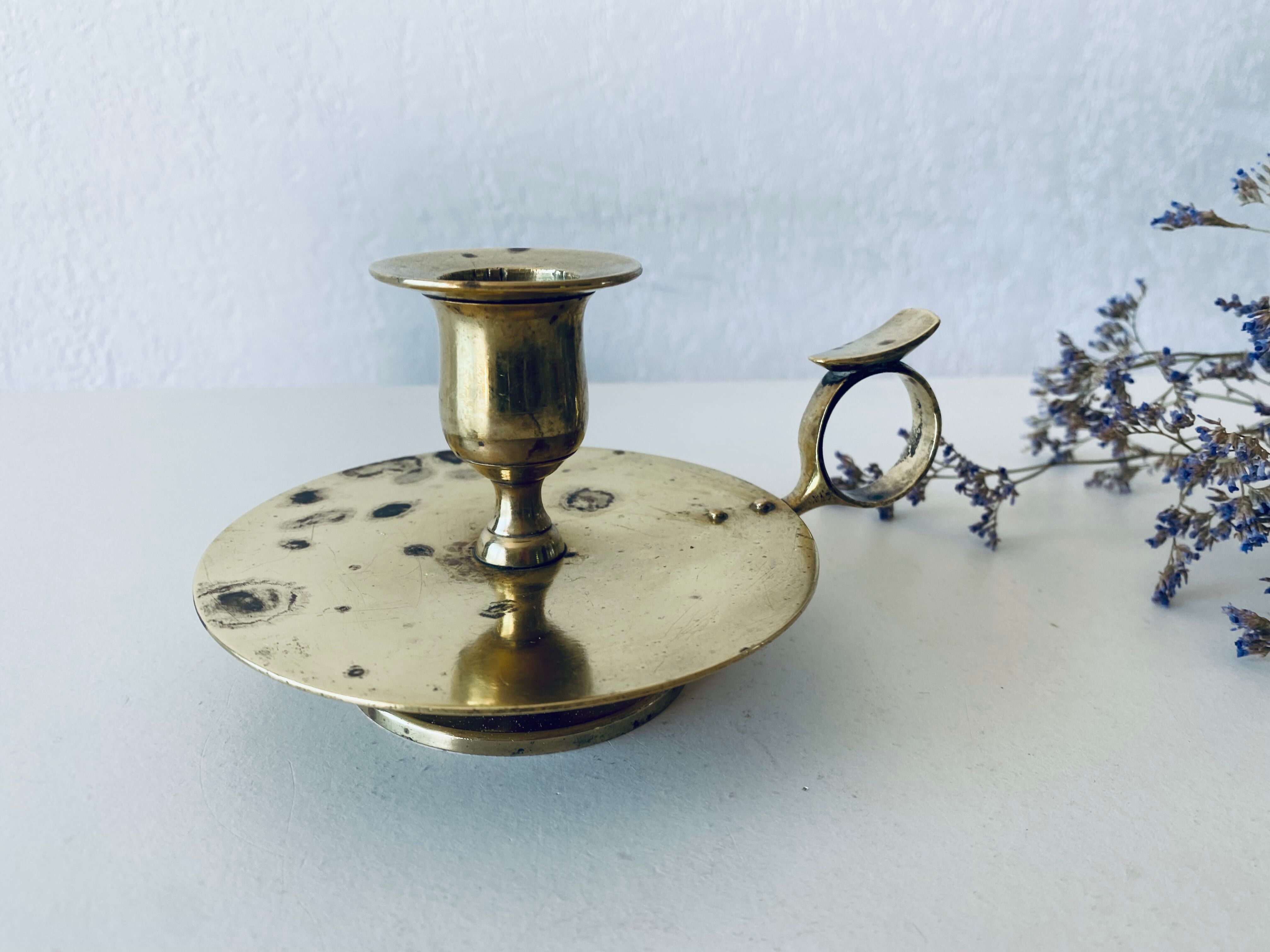 Old candle holder with handle