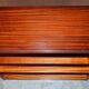 Pair of open low bookshelves Shaws of London in hardwood.