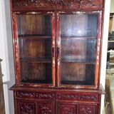 Asia 19th century: Ancient lacquer library, richly carved and adorned.