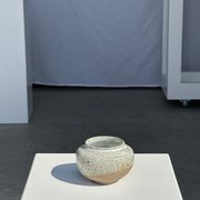 Small white ball vase tight neck in glazed speckled ceramic