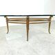Vintage golden metal and oval glass coffee table, 1970s