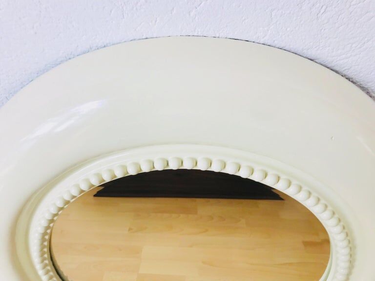 American beige round wall mirror 1970