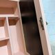 Small pink bathroom cabinet