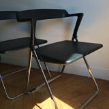 Arch folding chairs