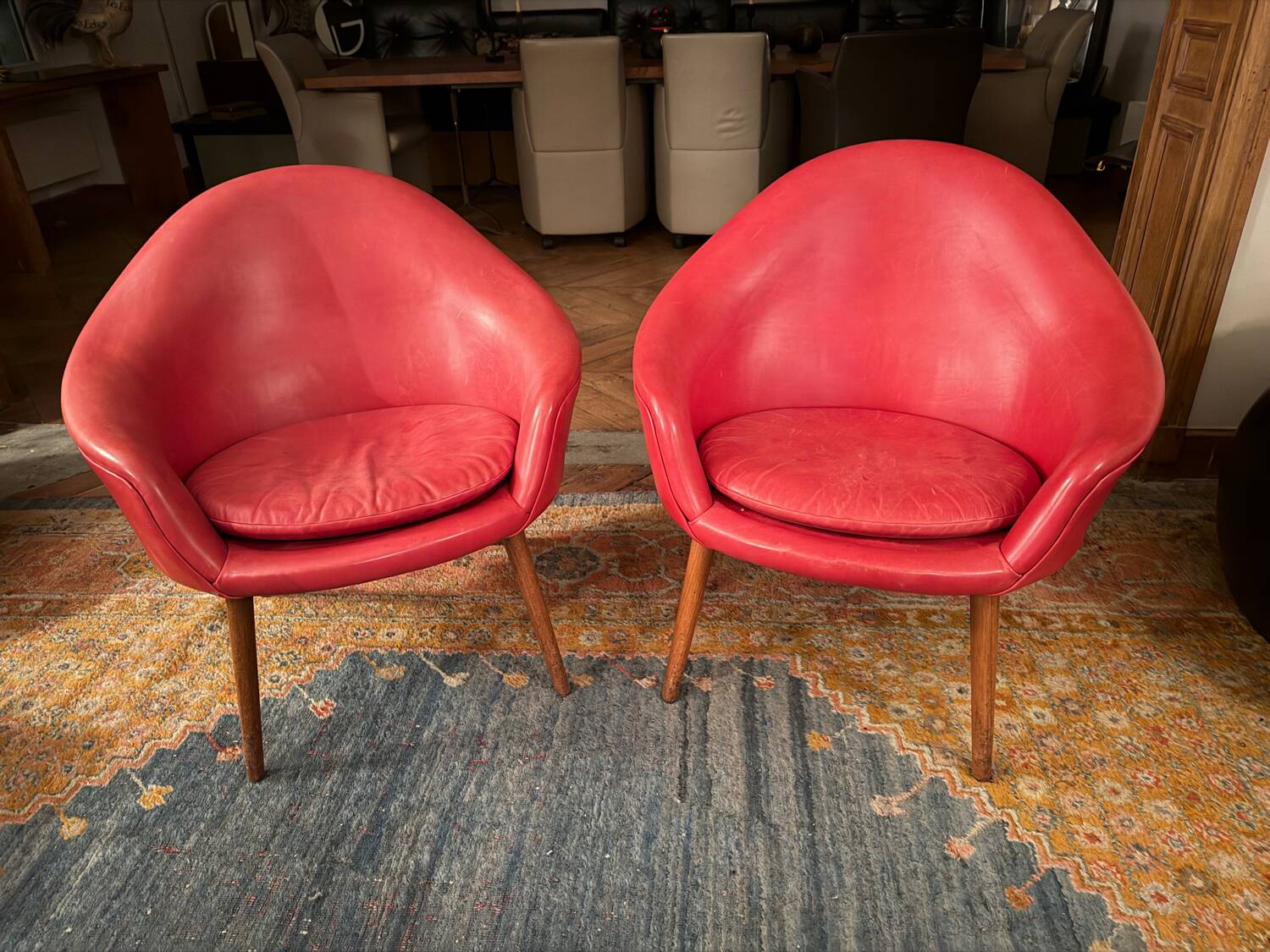 2 Hans Olsen armchairs, 1950s, red leather finish.