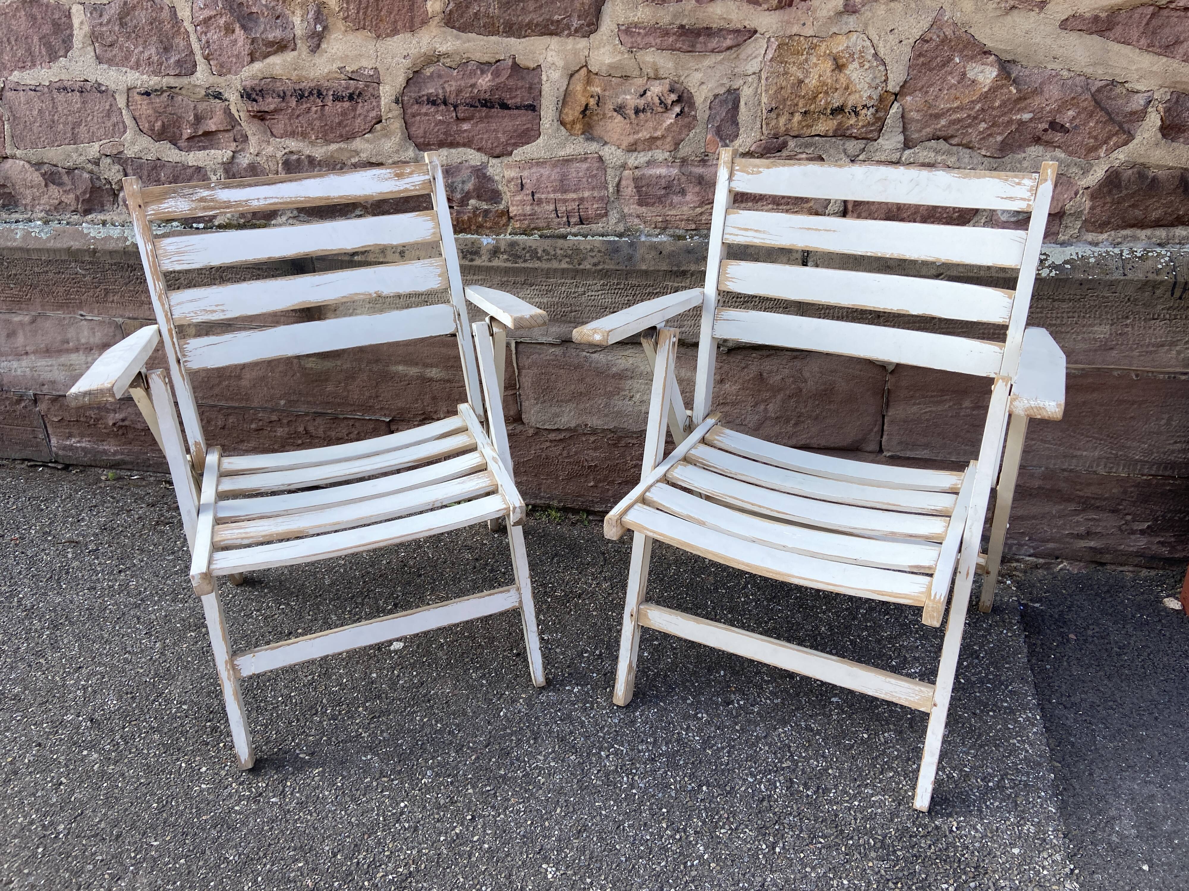 duo of folding garden armchairs brasserie cafe terrace Brasserie