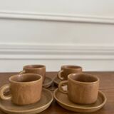 4 stoneware coffee cups and saucers
