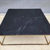 Coffee table or black marble and brass display "in its own juice"