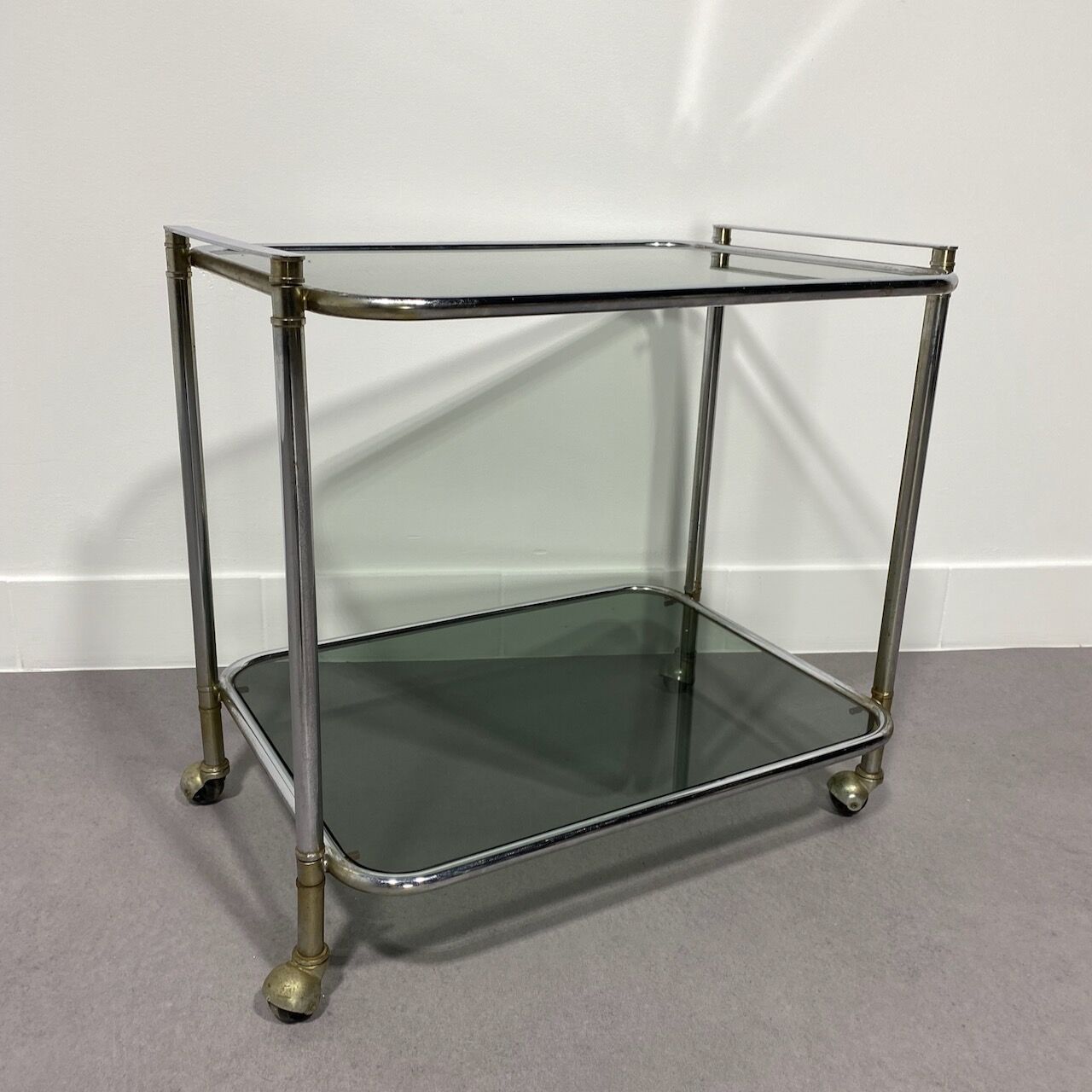 Chrome bar cart with green fume glass
