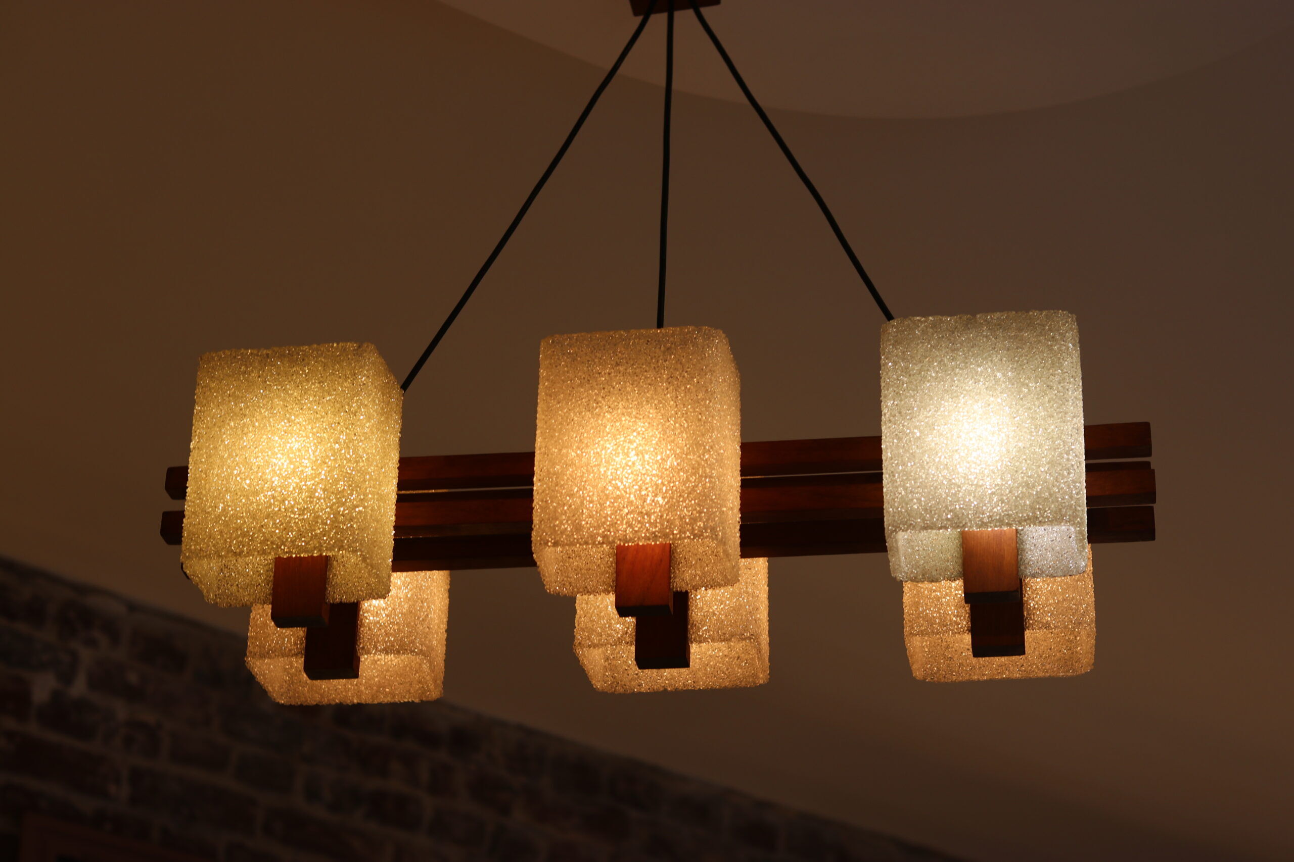 1960s Scandinavian suspension light in teak and perspex.