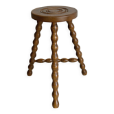 Antique three-legged twisted wooden stool