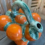 Jug of oranges in slip