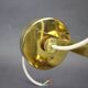 Set of four adjustable brass wall lights, Germany, 1960s.