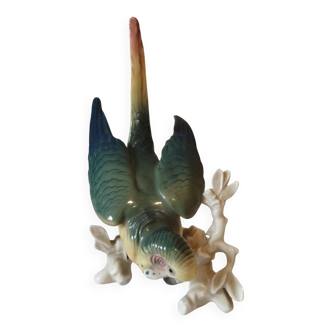 Polychrome porcelain parakeet figurine by Karl Ens.