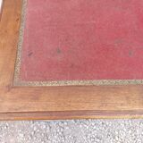 Old wooden desk, red felt top