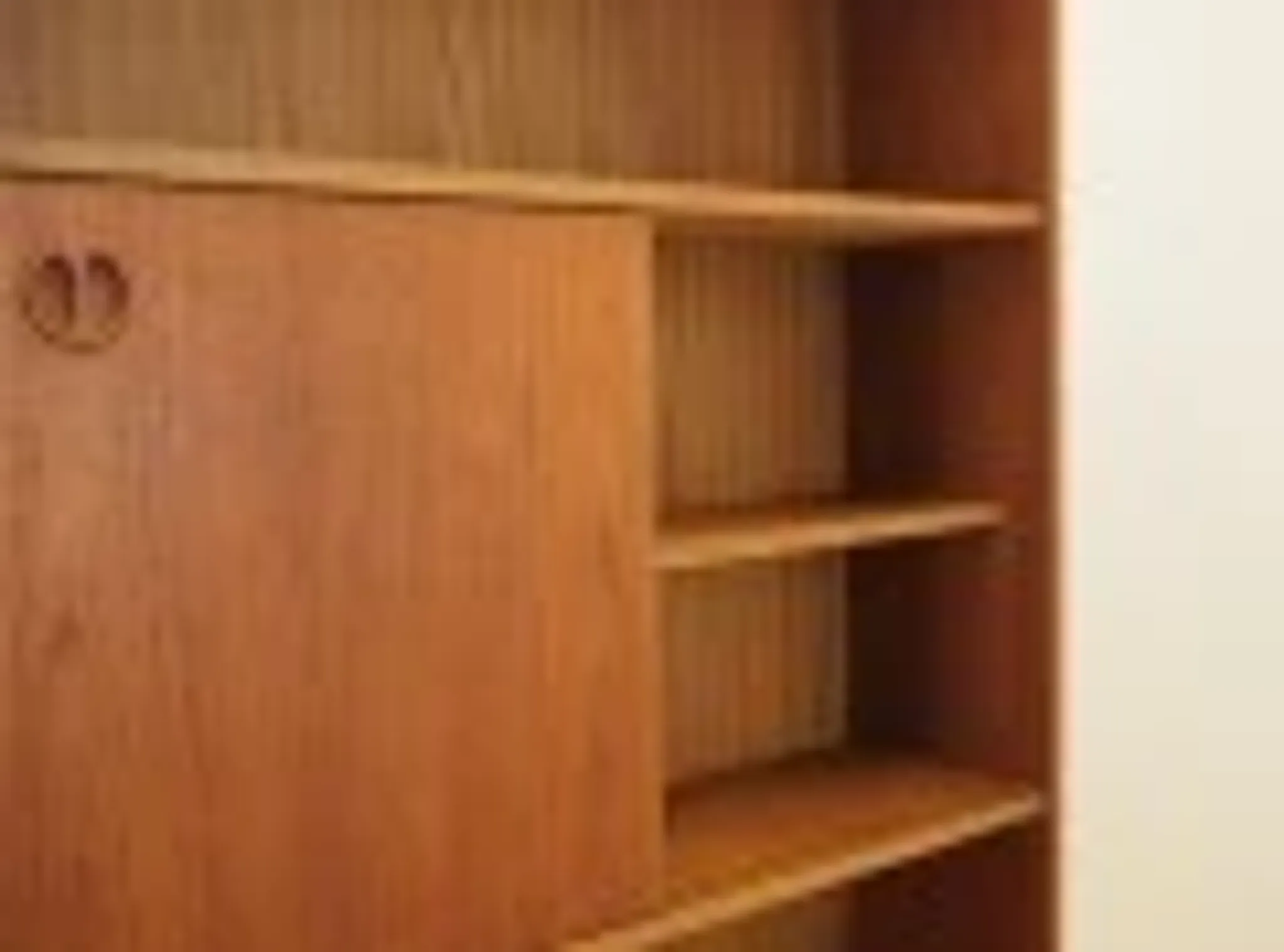 Danish teak veneered bookcase with sliding doors, 1970s