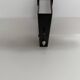 Simple white plexiglass wall light with a black metal frame, 1970s, Germany.