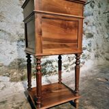Antique French bedside table with a marble top.