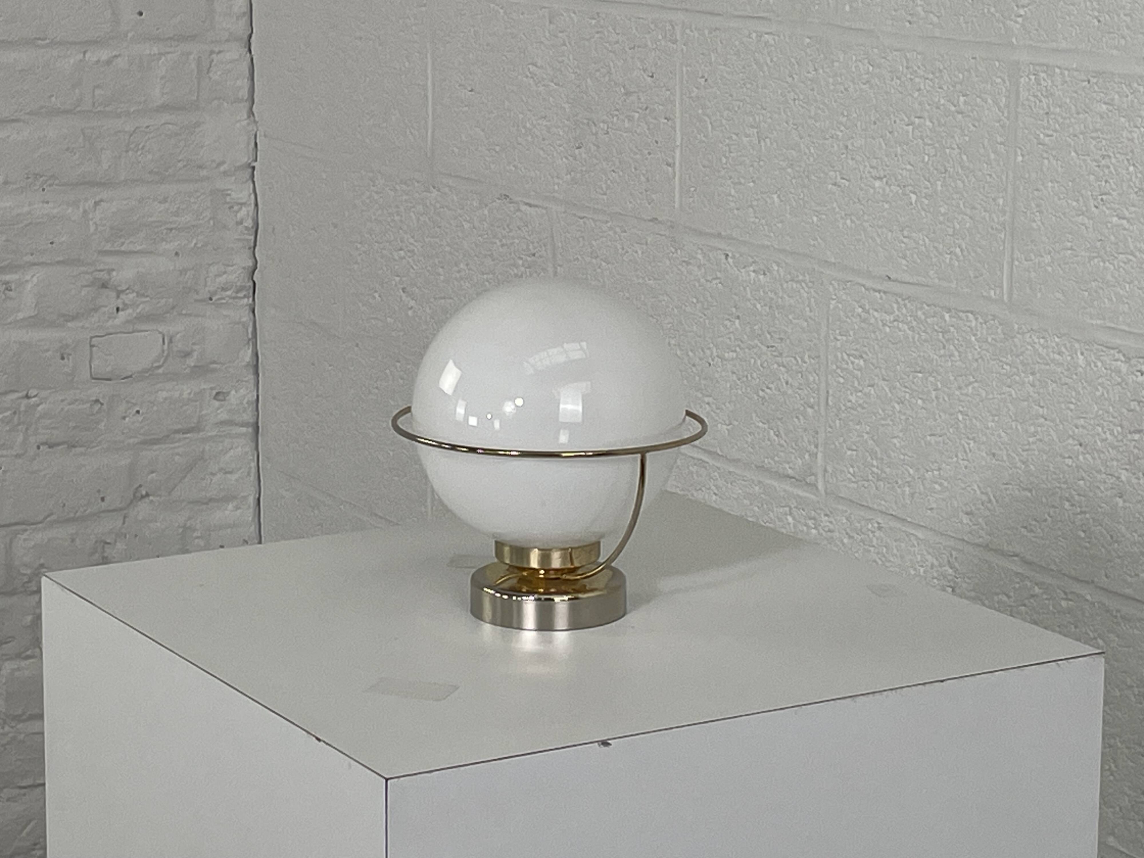 brass wall light from the 50s