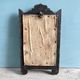 Antique wooden studded mirror