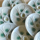 11 oyster plates 1960.