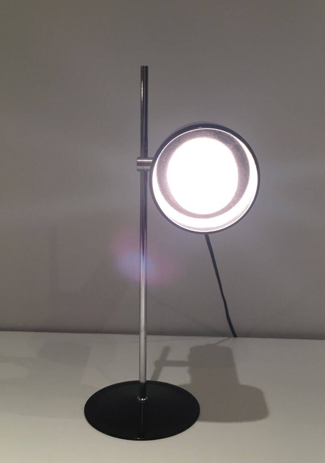 Adjustable lamp in black lacquered metal and chrome. French work. Circa 1970.