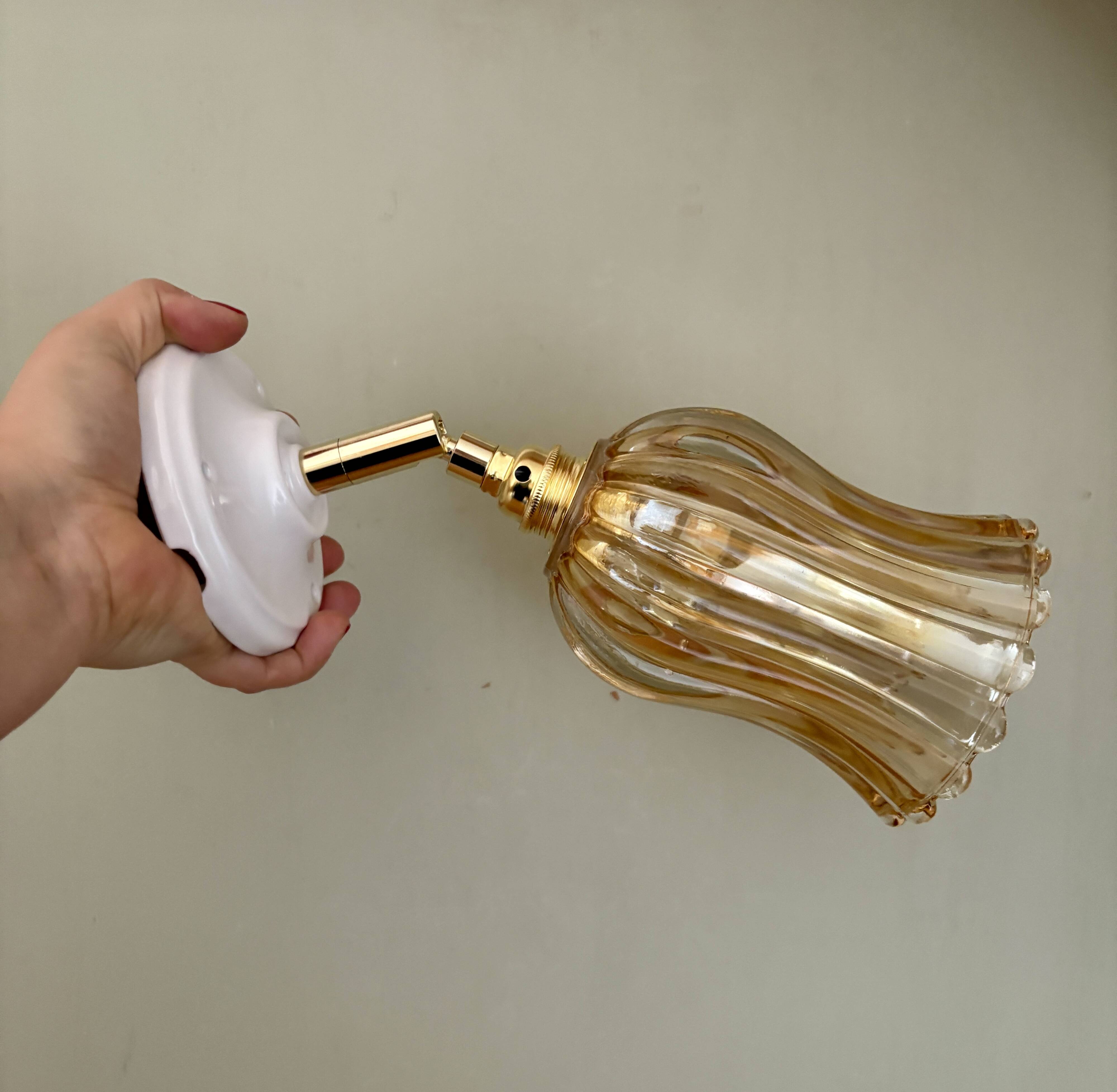 Vintage tulip wall light in thick amber glass