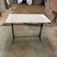 Antique bistro table in cast iron and marble.