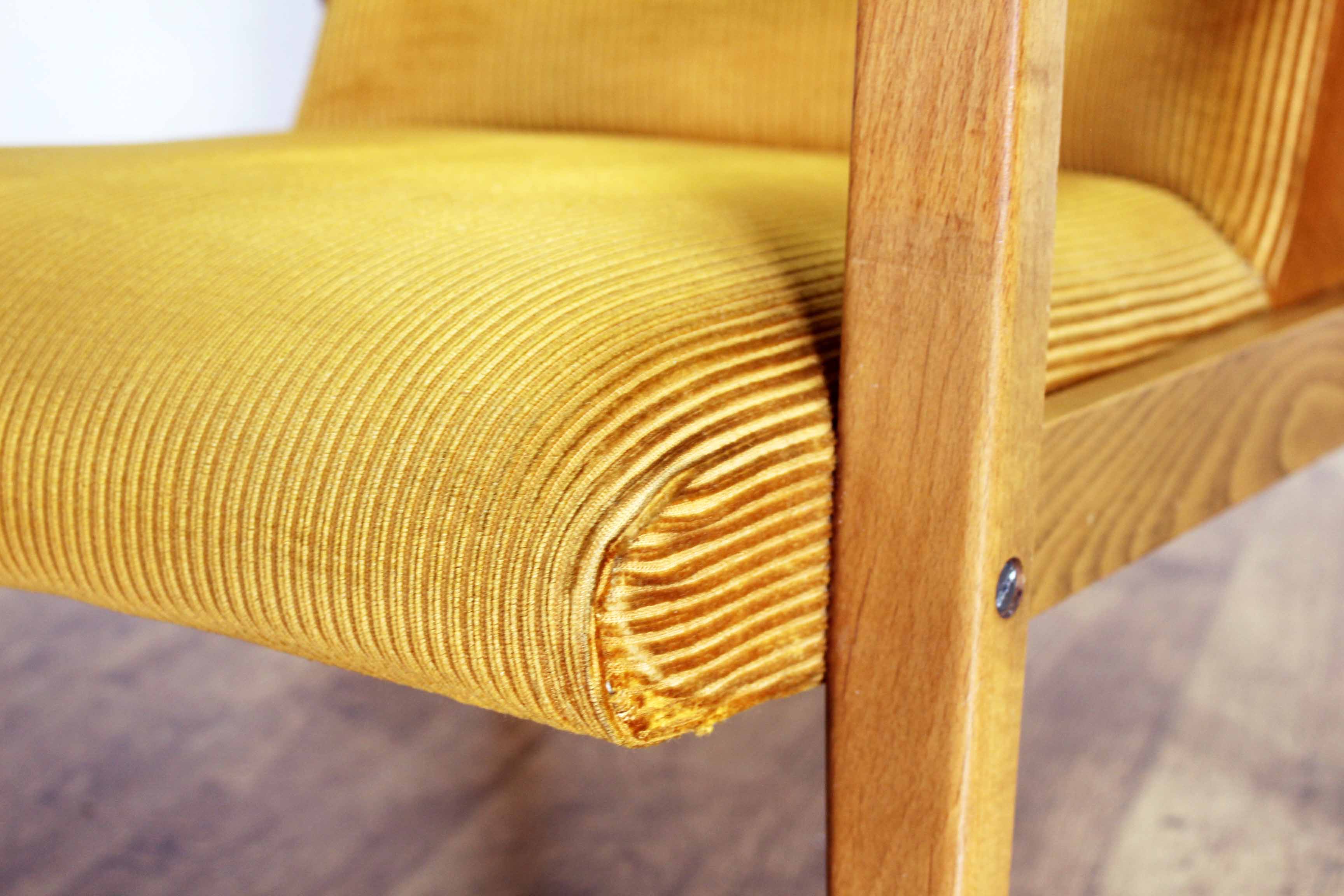 Scandinavian-designed chair in solid beech and mustard velvet