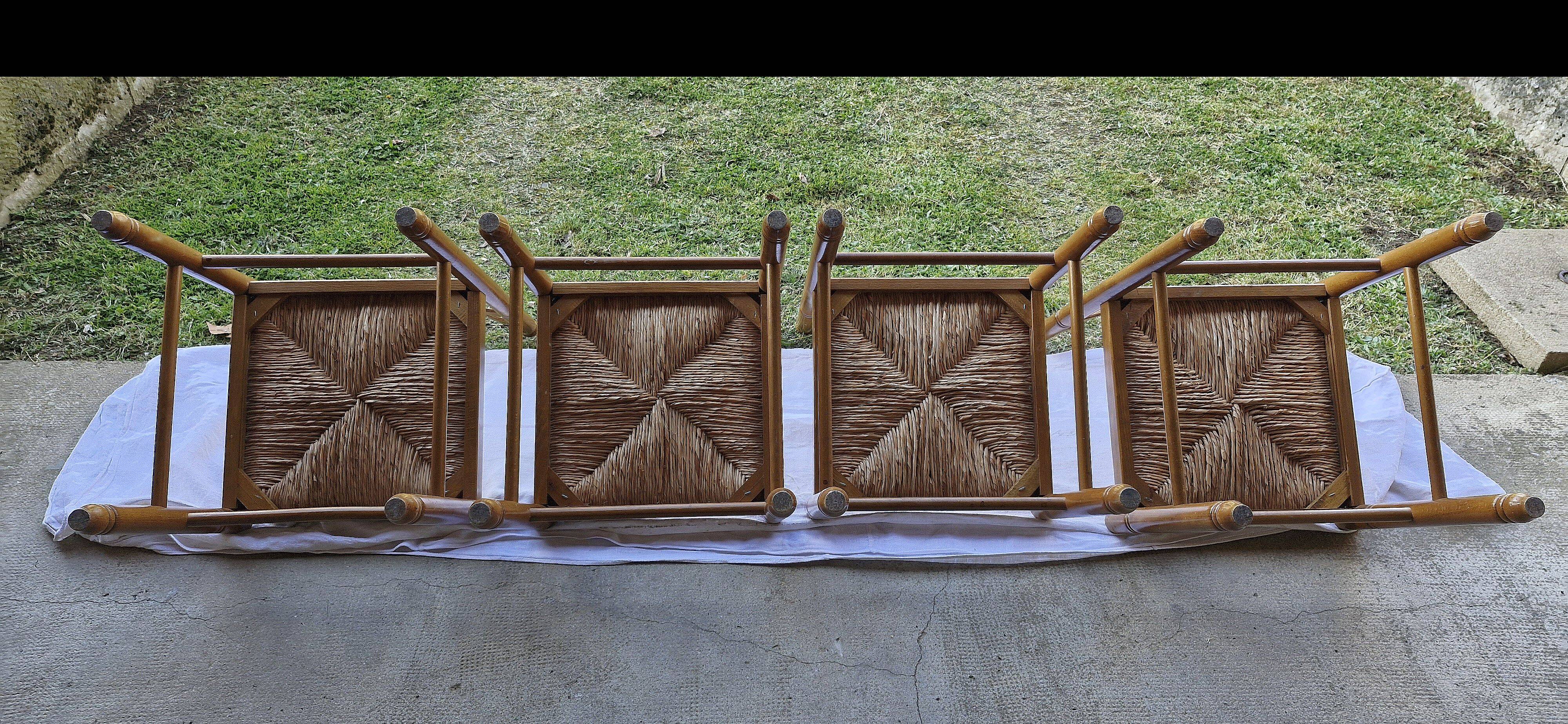 Wooden table with 2 extensions + 4 wooden chairs with rush seats