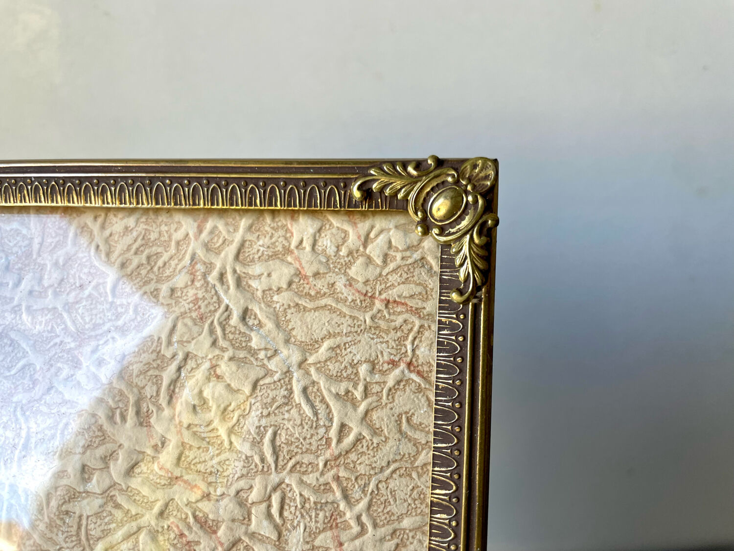Metal vintage frame in gold colored brass