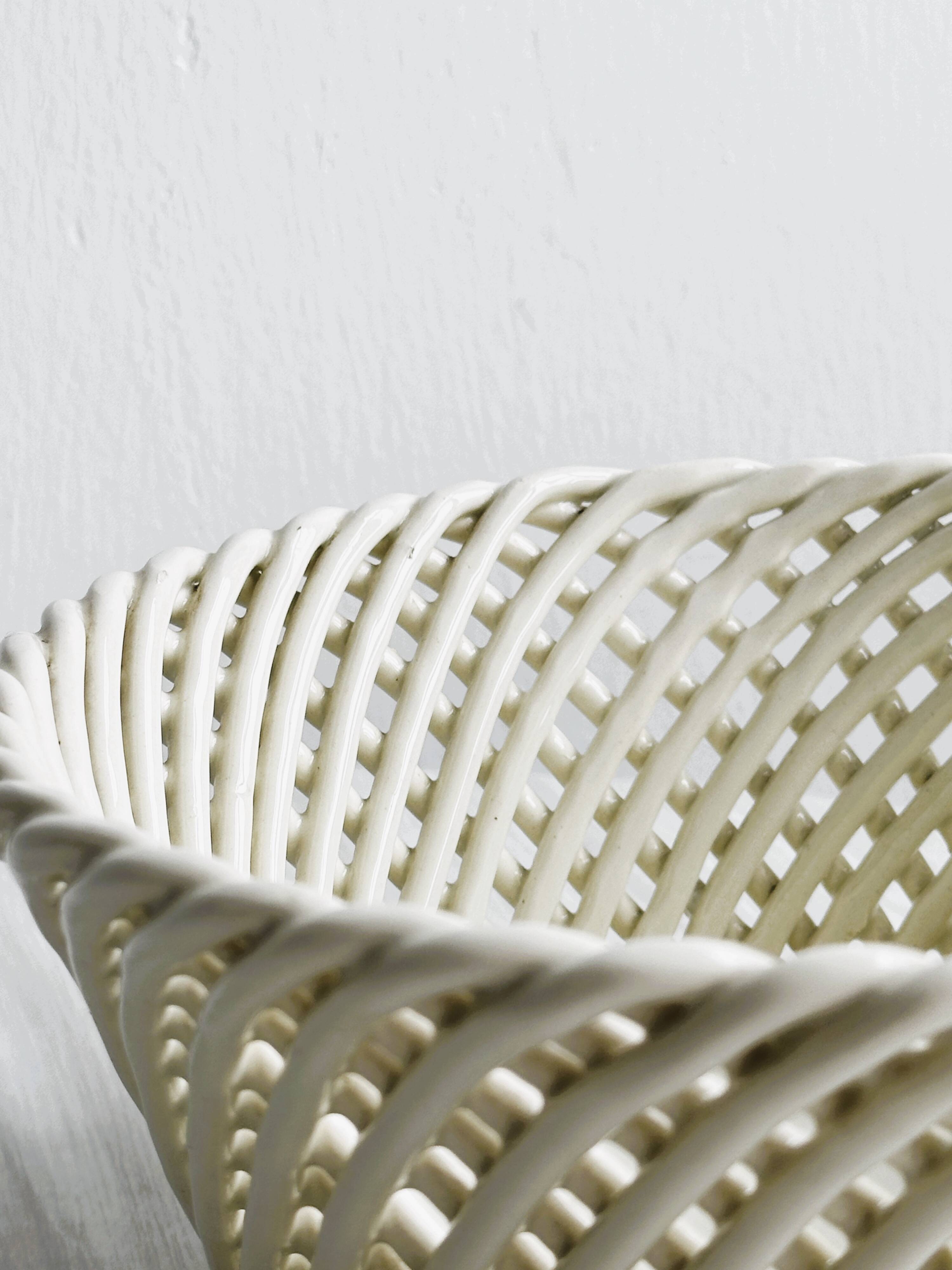Bread basket - openwork white ceramic bowl.