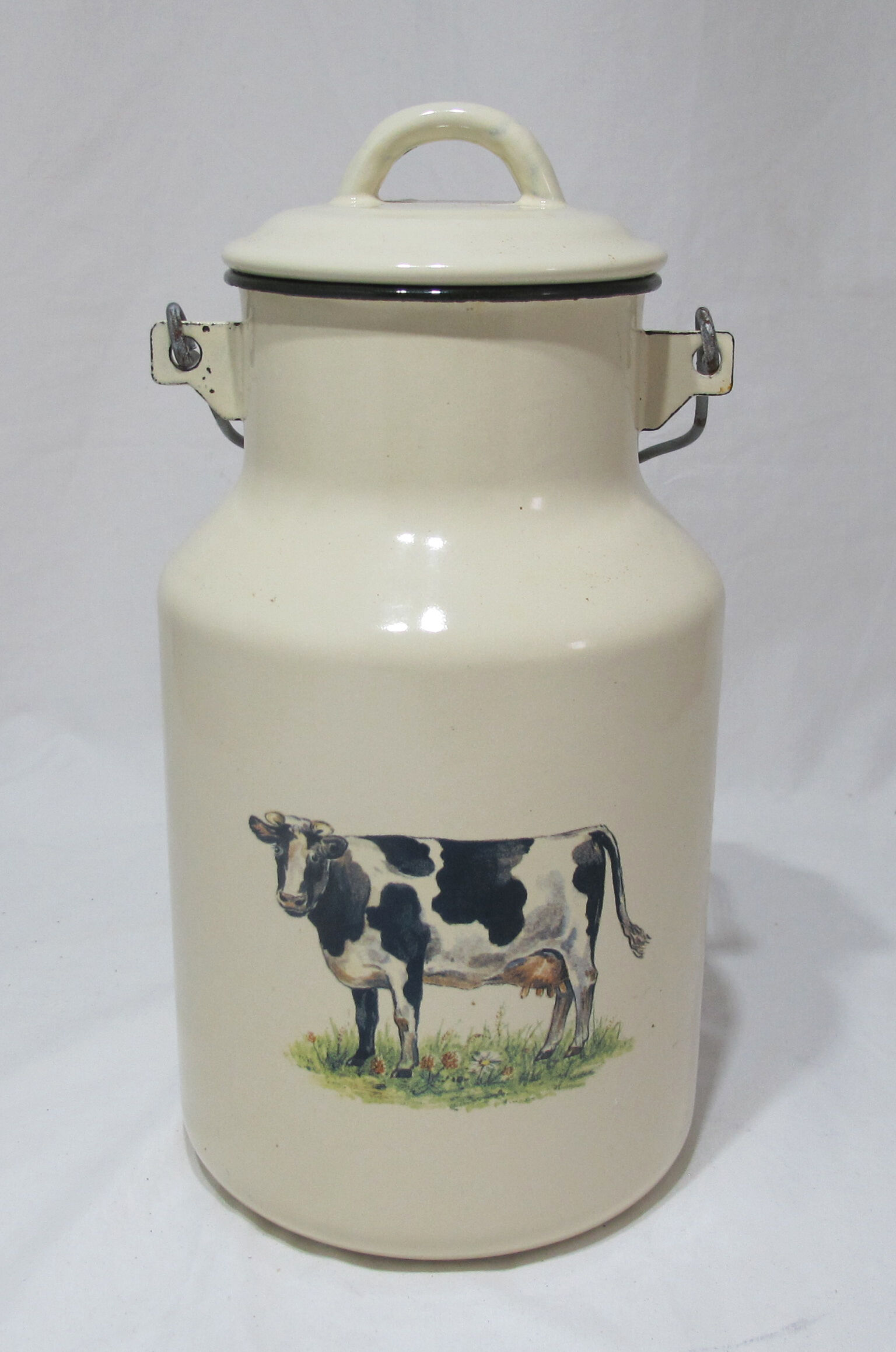 Milk jug in vintage enamelled sheet metal