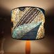 Mid-century wooden table lamp, blue wax lampshade.