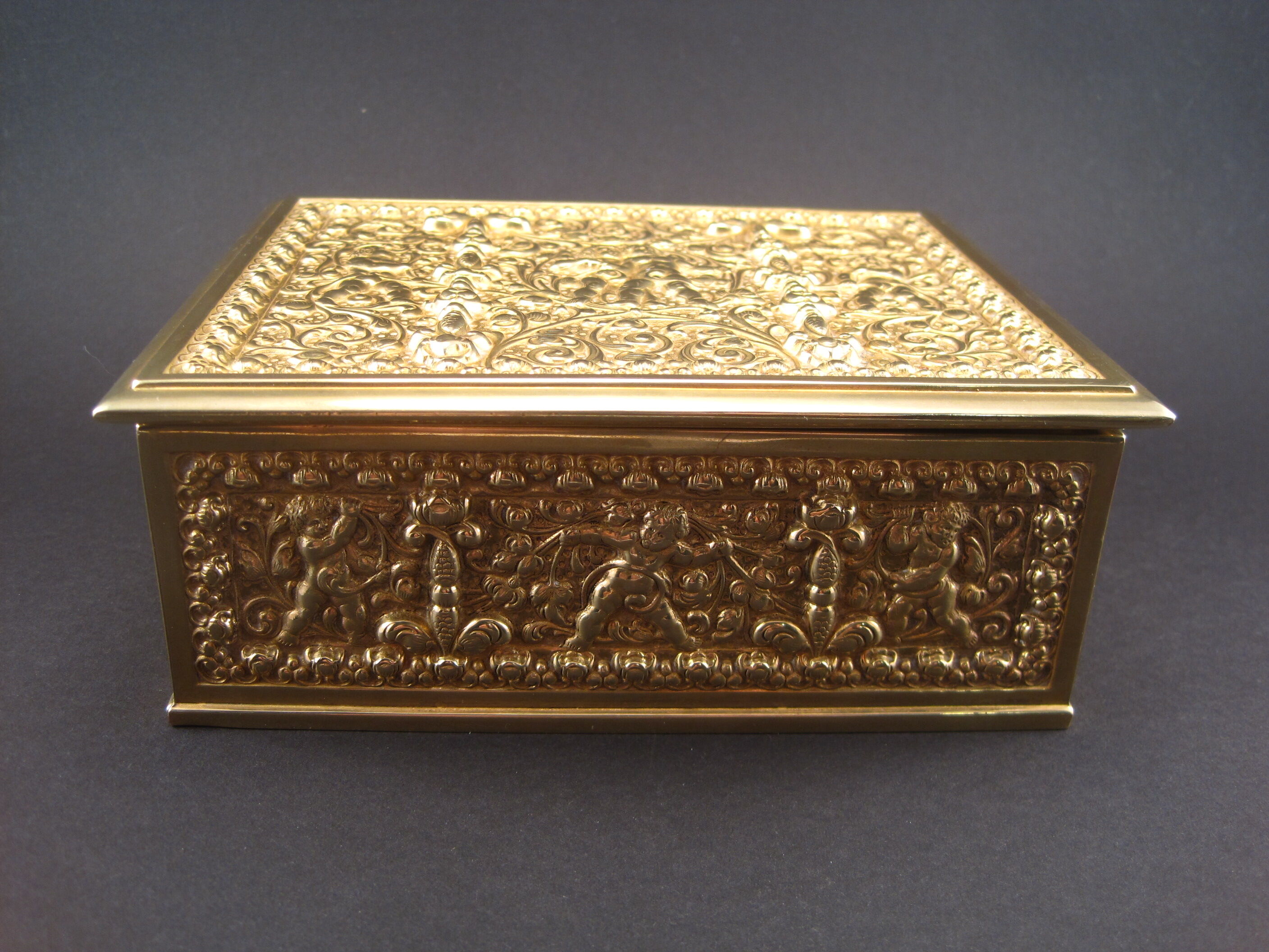 Golden brass cigar box manufactured by Erhard & Söhne around 1920