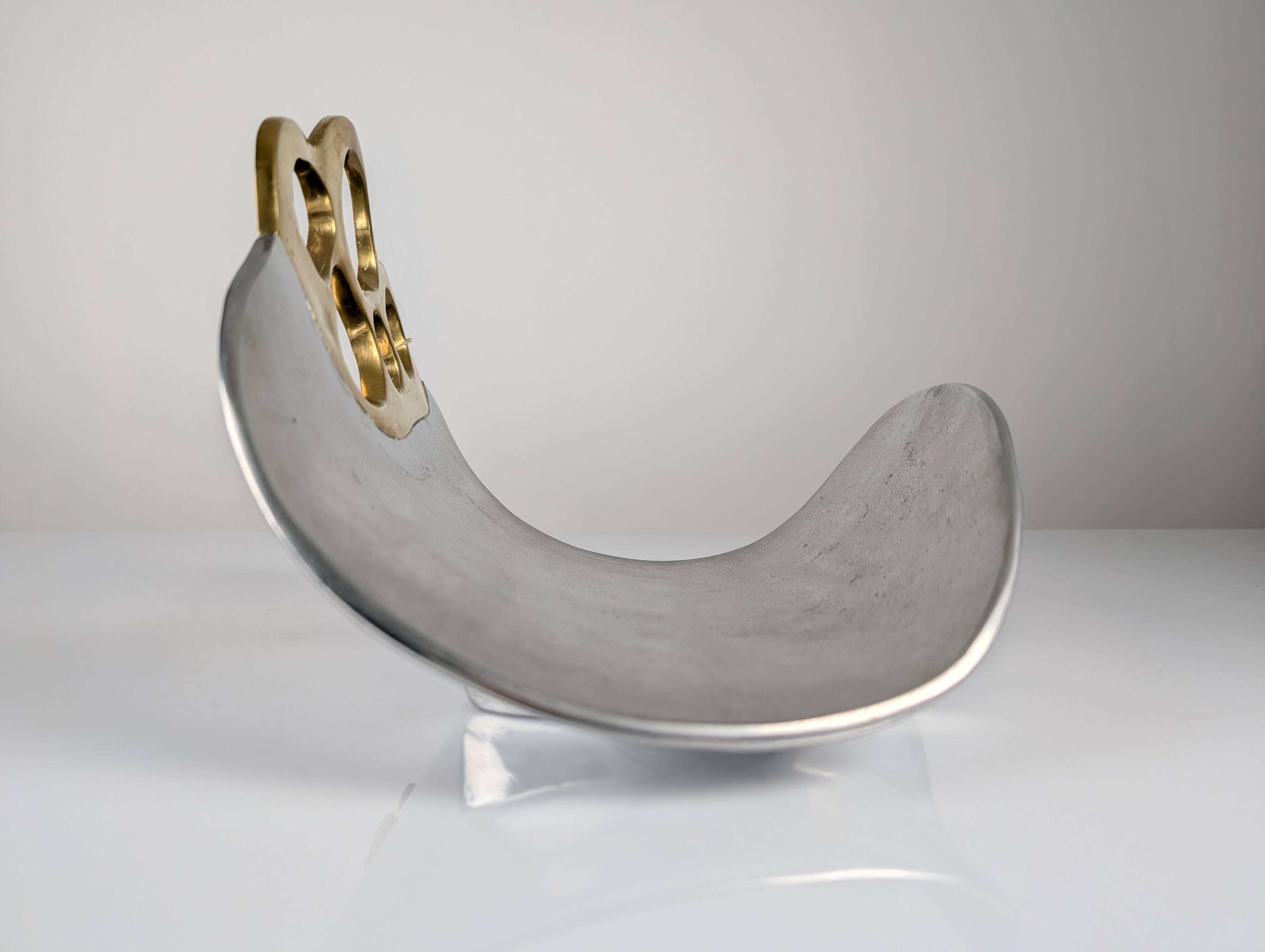 Aluminium and brass log holder by David Marshall, Spain, 1980s