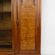 Art Deco showcase bookcase in carved walnut, France, circa 1925