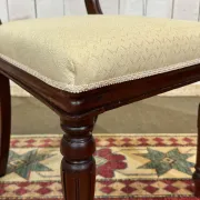 Set of 2 armchairs and 6 English mahogany chairs from the 1950s.