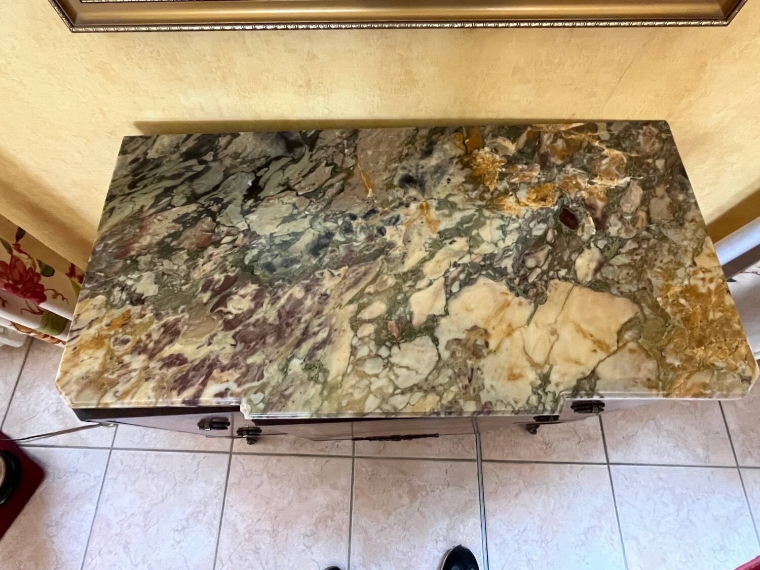 Small piece of furniture with marble top