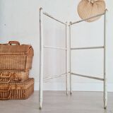 Old towel rack in patinated white wood