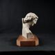 Terracotta bust of the smiling angel from Reims Cathedral with base