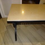 Wrought iron coffee table and beige marble top